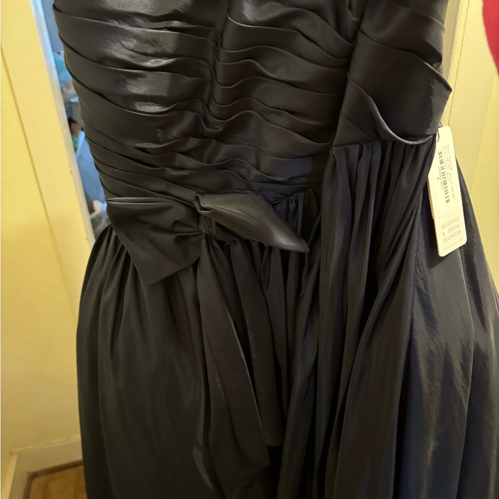 Customer never worn dress   Big and puffy underneath